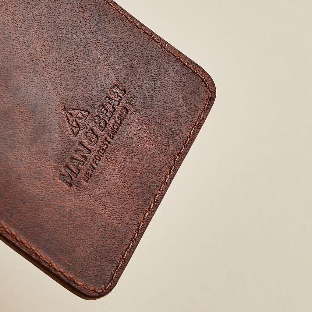 Man & Bear logo debossed into brown leather
