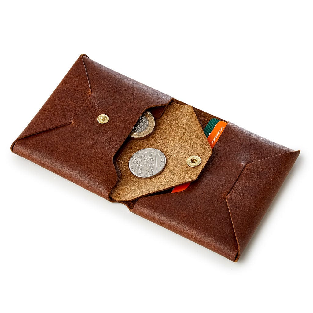 Brown leather origami wallet with coin pocket by Man & Bear - cut out - shown with coins and cards