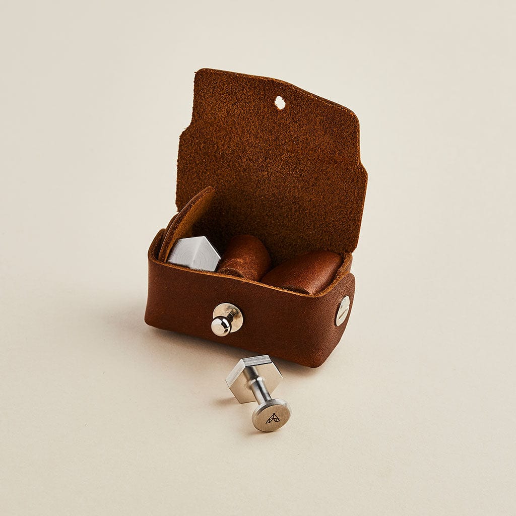 Brown leather cufflink pouch with steel Man & Bear cufflinks