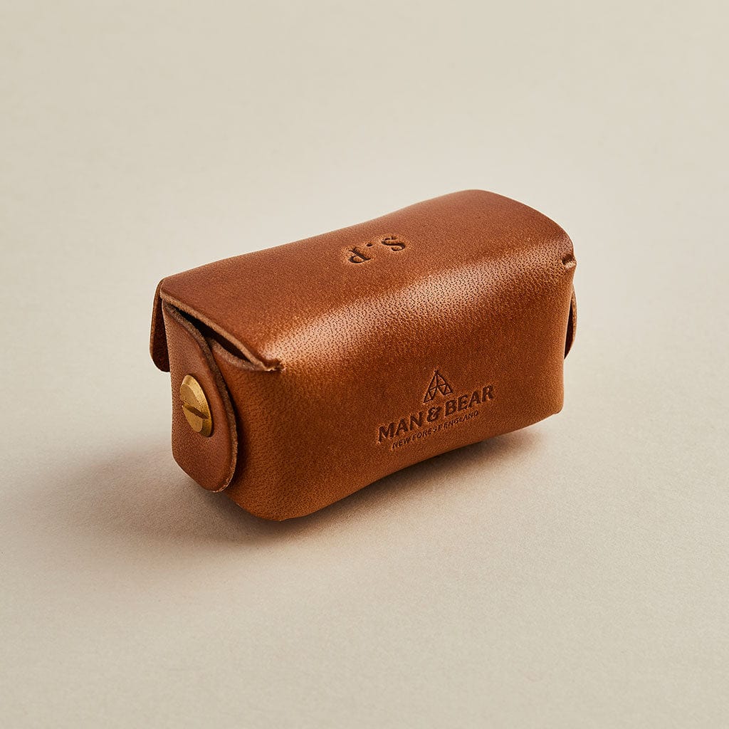 Leather cufflink pouch with Man & Bear branding