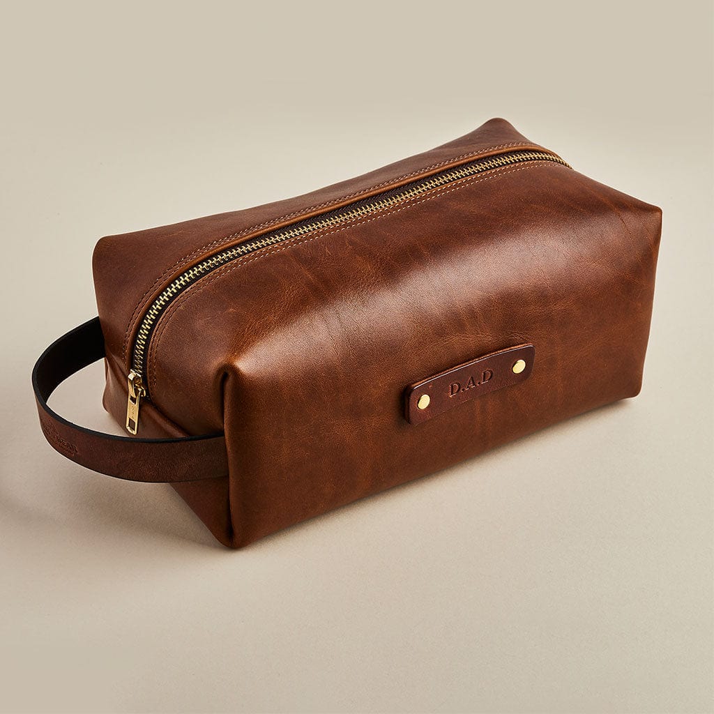 Brown leather men's wash bag with personalised initials, made by Man & Bear