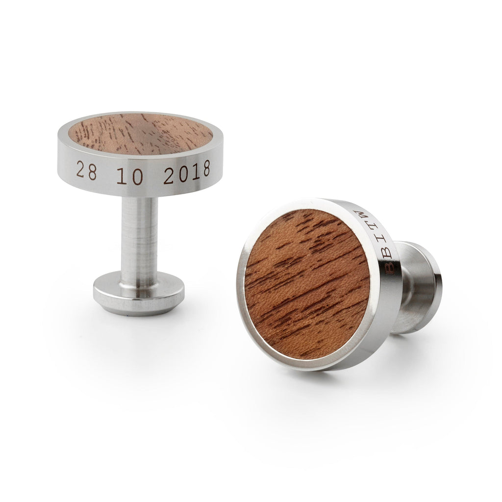 Stainless steel cufflinks engraved with personalised messages, with a dark walnut wood inlay. Made by Man & Bear.
